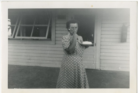 Woman holding a cake (ddr-manz-7-33)