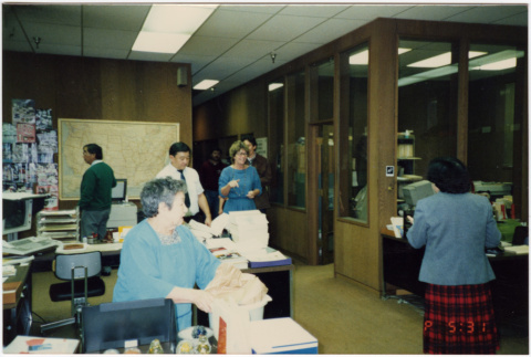 Group standing in office (ddr-densho-426-386)