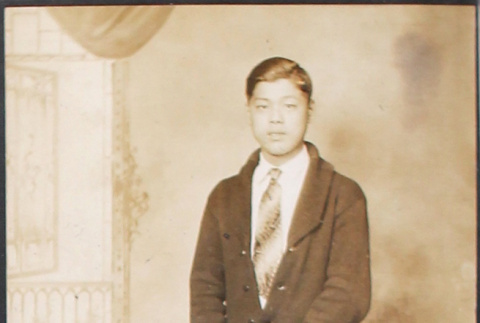 Portrait of man standing (ddr-densho-493-161)