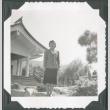 A woman outside of the Japan Pavilion at the Golden Gate International Exposition (ddr-densho-300-207)