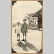Two children holding hands (ddr-densho-542-170)