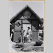 Shiomi family standing outside Birkholm's Danish Smaakage Hus (ddr-densho-522-587)