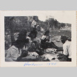 Group sitting on ground at picnic (ddr-densho-464-71)