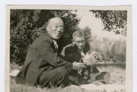 2 men on picnic (ddr-densho-480-115)