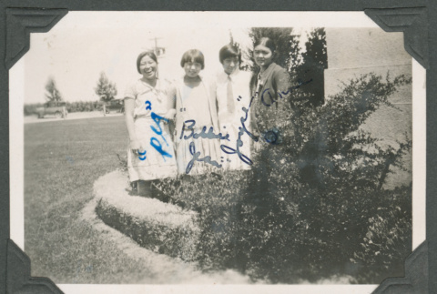 Signed photo of four girls (ddr-densho-483-253)