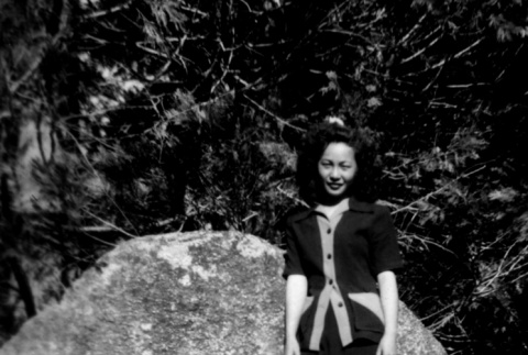 Amy Nagata standing on a boulder (ddr-densho-336-18)
