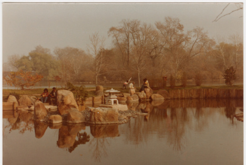 People enjoying the pond (ddr-densho-377-2110)