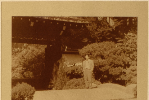 Gary Kikawa stands on a path (ddr-densho-542-31)