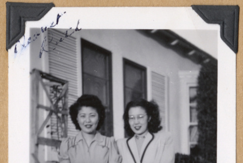Two women outside a home (ddr-densho-542-303)