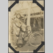 A woman on a bicycle (ddr-densho-432-138)