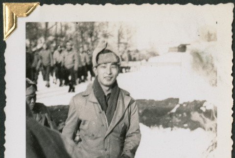 Man walking in snow (ddr-densho-434-311)