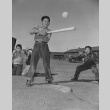 Sixth grade boys playing softball during recess at Manzanar incarceration camp (ddr-csujad-14-19)