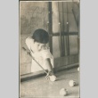 Kiku Fujii playing pool (ddr-densho-321-553)