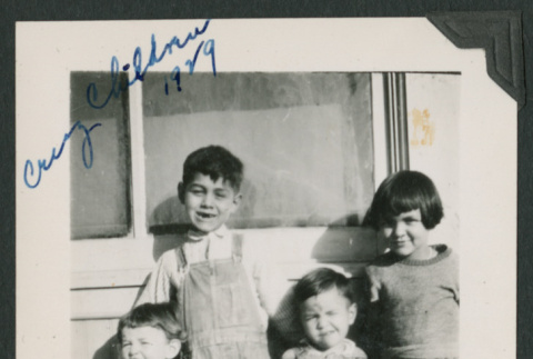 four kids outside (ddr-densho-378-739)