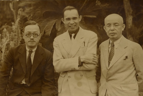 Hilario Moncado posing with two men (ddr-njpa-2-721)