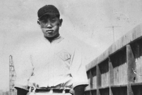 Masao Nakano in baseball uniform standing in field (ddr-ajah-5-96)