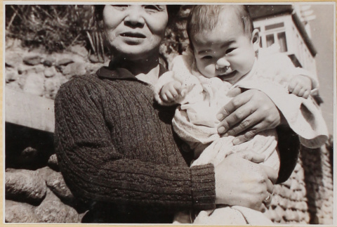 Woman holding baby (ddr-densho-522-32)