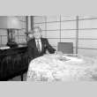 Kiyofumi Kojima at table (ddr-densho-1007-576)