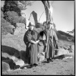 Two men standing on hillside (ddr-densho-426-269)