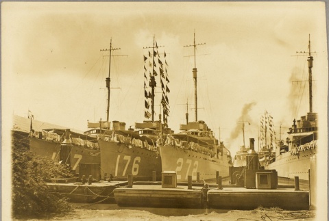 Navy ships lined up in a dock (ddr-njpa-13-395)