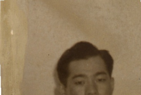 Man wearing leis (ddr-njpa-4-2321)