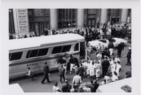 Black and White photo of baseball team boarding bus (ddr-densho-426-12)
