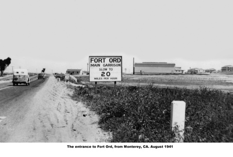 Road and sign at entrance to Fort Ord (ddr-ajah-2-762)