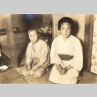 Two women kneeling on tatami mats (ddr-njpa-4-2664)
