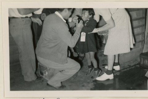 Little girl examined for a health inspection (ddr-densho-37-905)