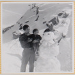 Hardy Shiomi holding Susan Shiomi next to snowman (ddr-densho-522-239)