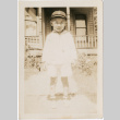 Young boy outside house (ddr-densho-430-306)