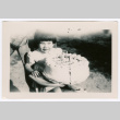 Young girl with birthday cake (ddr-densho-475-356)