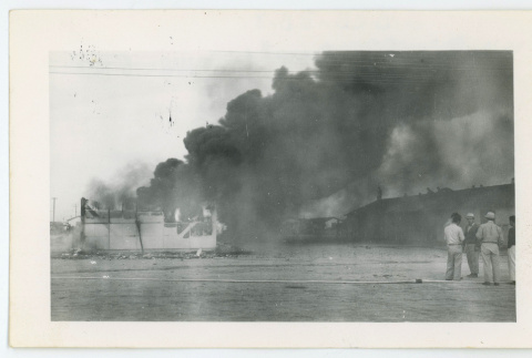 Gila River building on fire (ddr-densho-37-2140)