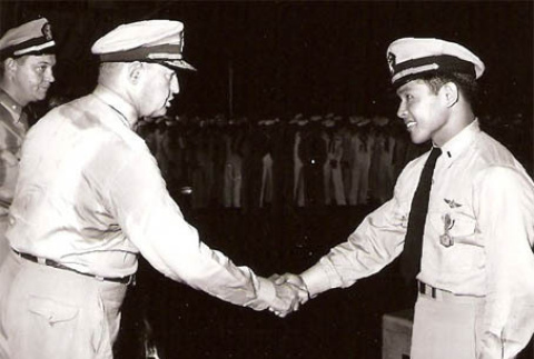 Pilot receiving a medal (ddr-densho-513-10)