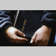 Camper holding a Bible (ddr-densho-336-1788)