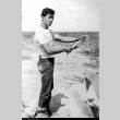 Boy with a rattlesnake (ddr-densho-162-54)