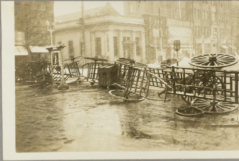 Overturned carts serving as a road block (ddr-njpa-13-1402)