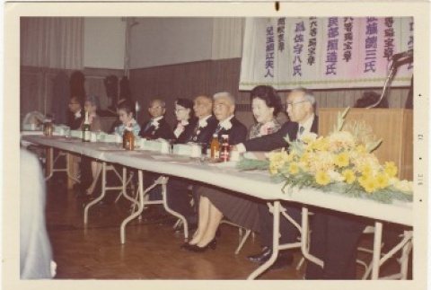 Group sitting at banquet table (ddr-densho-333-55)