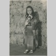 Young Japanese girl dressed in a kimono (ddr-densho-299-181)