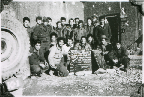 Group of men with Hotel Maginot sign (ddr-densho-1007-817)
