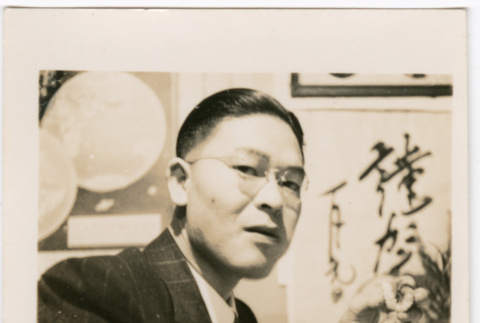Man eating sushi (ddr-densho-426-2119)