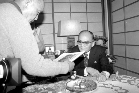 Kiyofumi Kojima and one other at table (ddr-densho-1007-575)