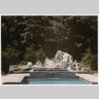 Rock feature at back of pool (ddr-densho-377-2414)
