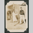 man and woman with tennis rackets (ddr-densho-378-486)