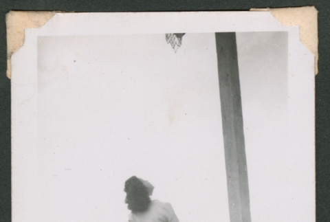 Woman playing basketball (ddr-densho-463-100)