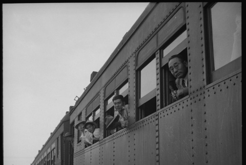 Japanese Americans saying goodbye from train (ddr-densho-151-296)