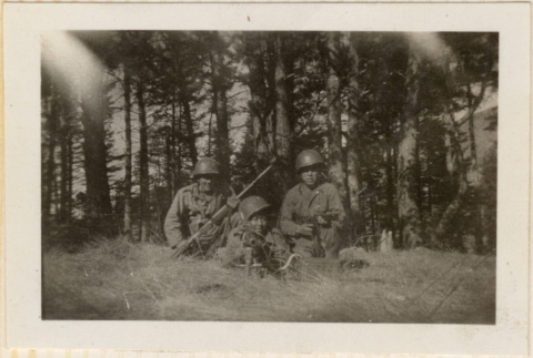 Three men with machine gun (ddr-densho-466-260)