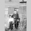 Two children in front of a house (ddr-densho-26-8)