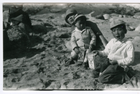 Susumu and Tory Miyoshi at beach (ddr-densho-480-156)