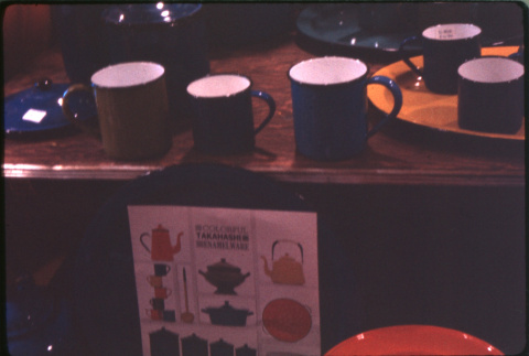Display of enamelware cups (ddr-densho-426-345)